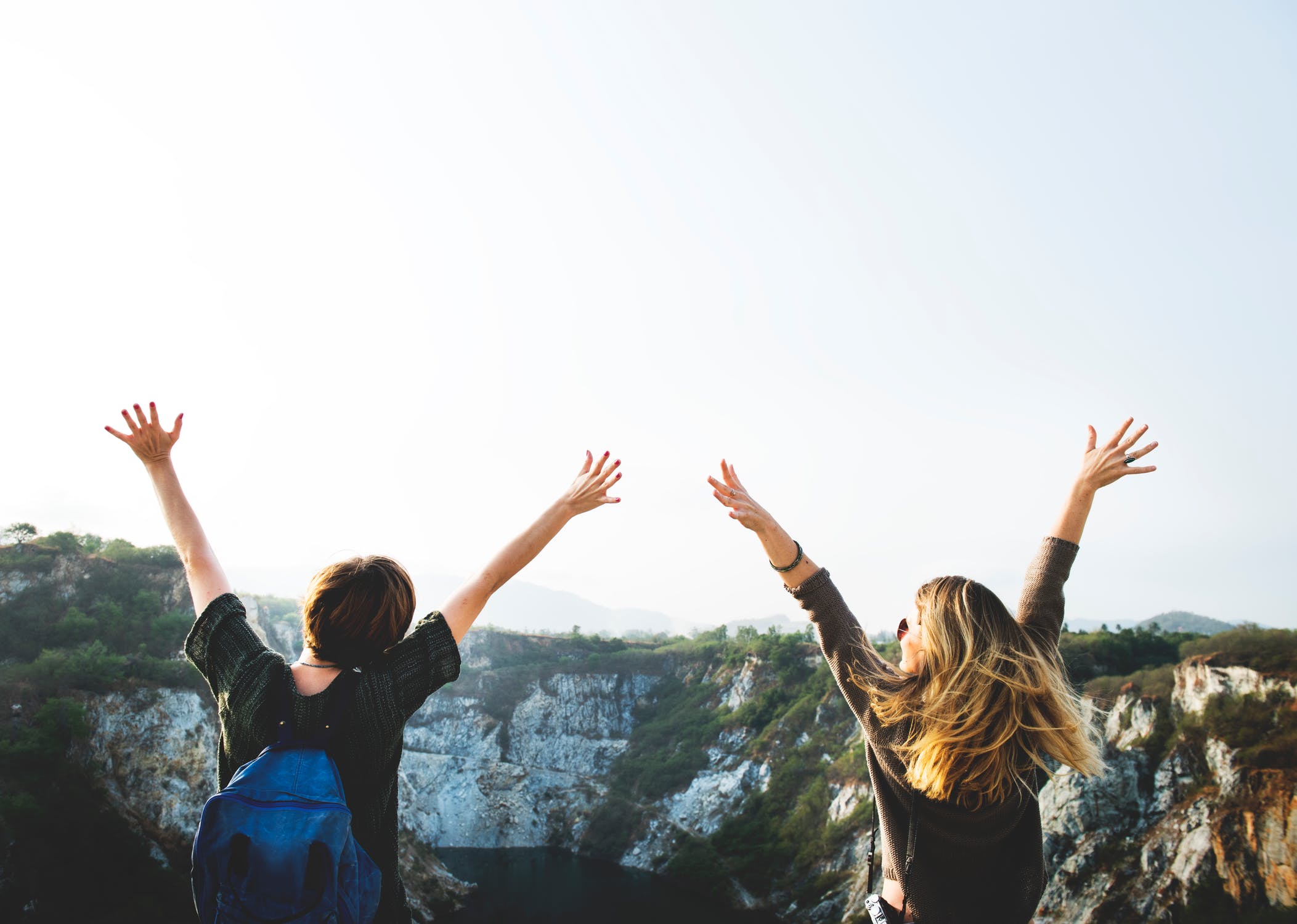 Women with arms outstretched