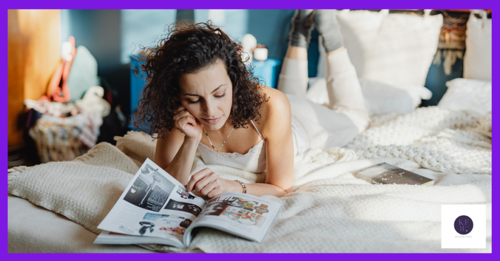 A woman lies in bed reading an article talking about transformation